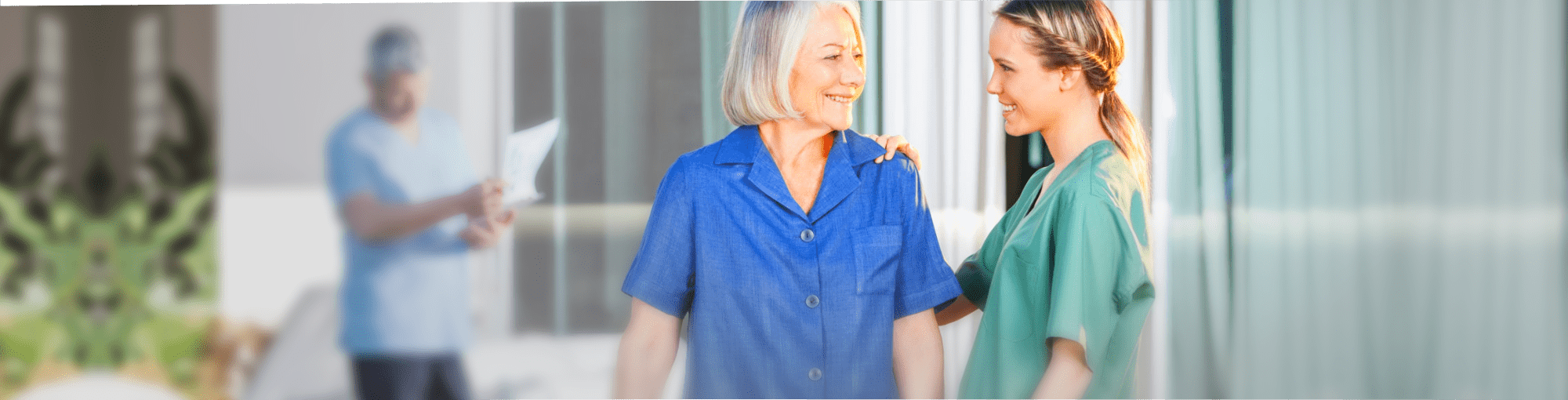 elderly woman with her caregiver