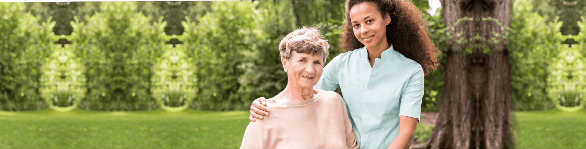 elderly woman with her caregiver outdoors